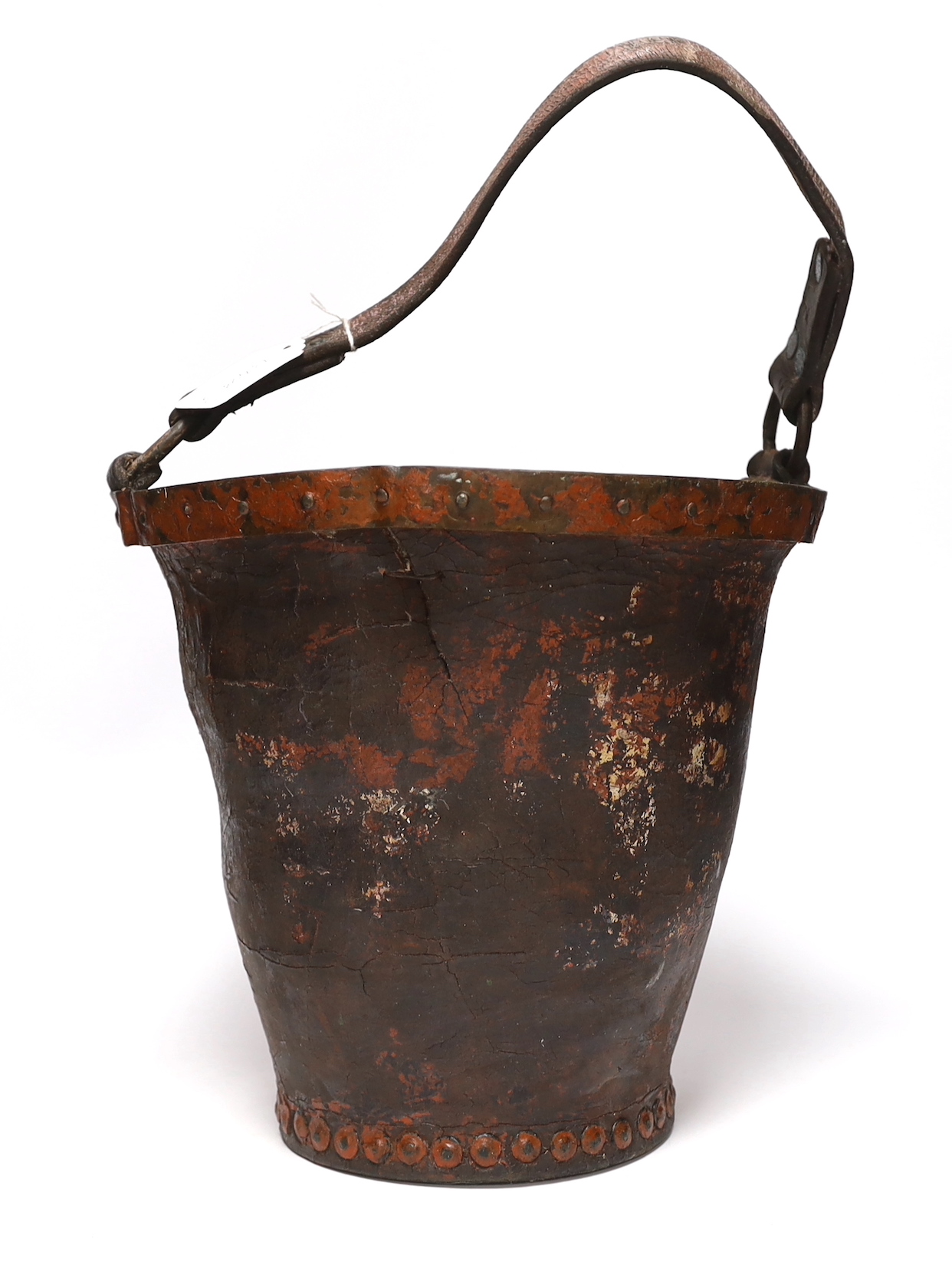 A painted leather fire bucket with the remains of what might have been an armorial crest, 26.5cm high